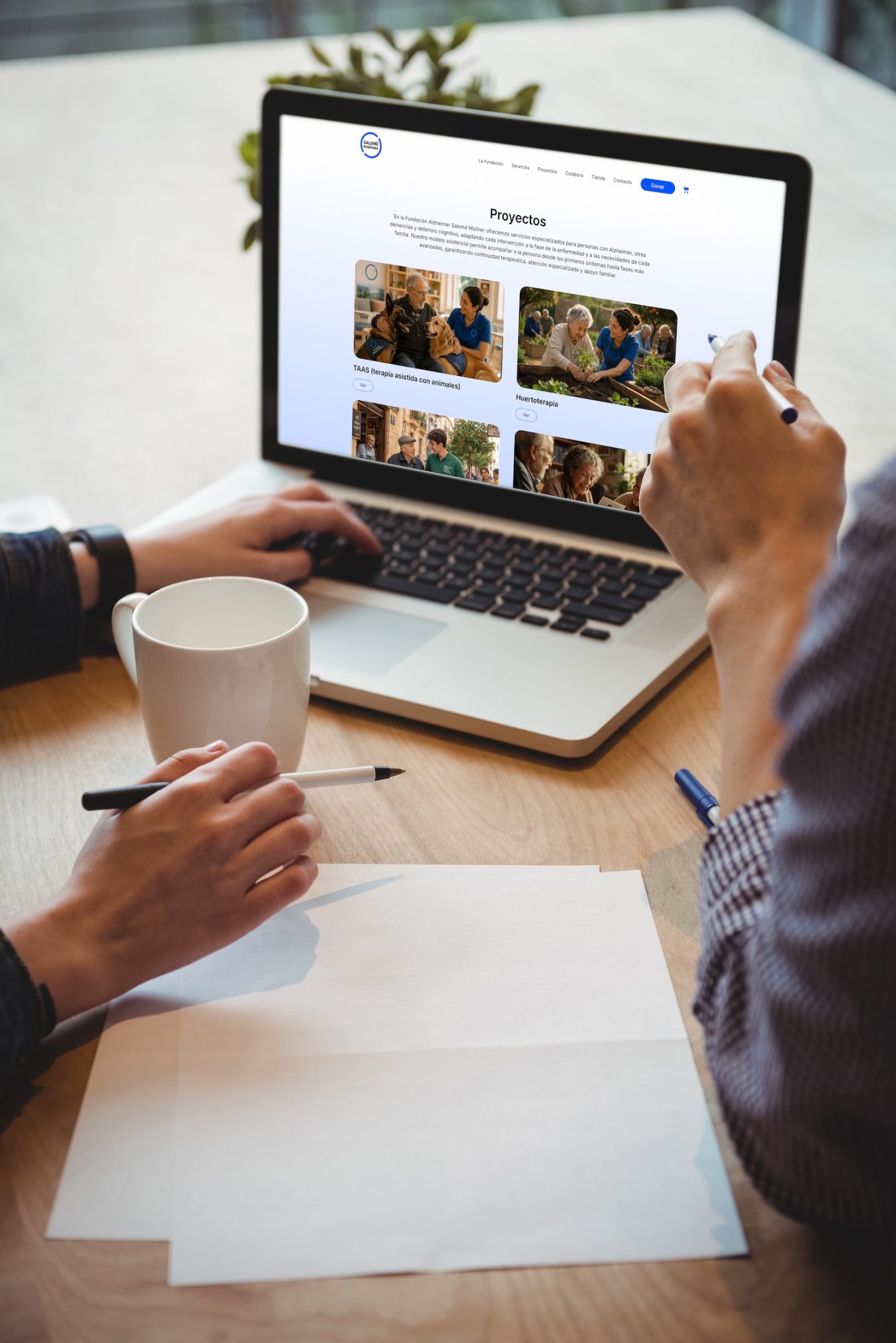 Business executives discussing over laptop in office